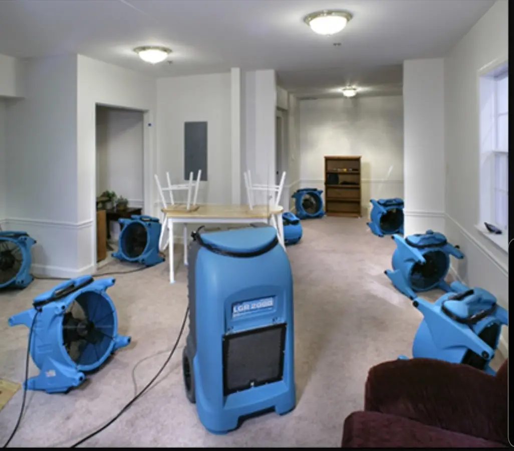 Air movers and dehumidifier setup for Water Extraction & Removal in Fall River